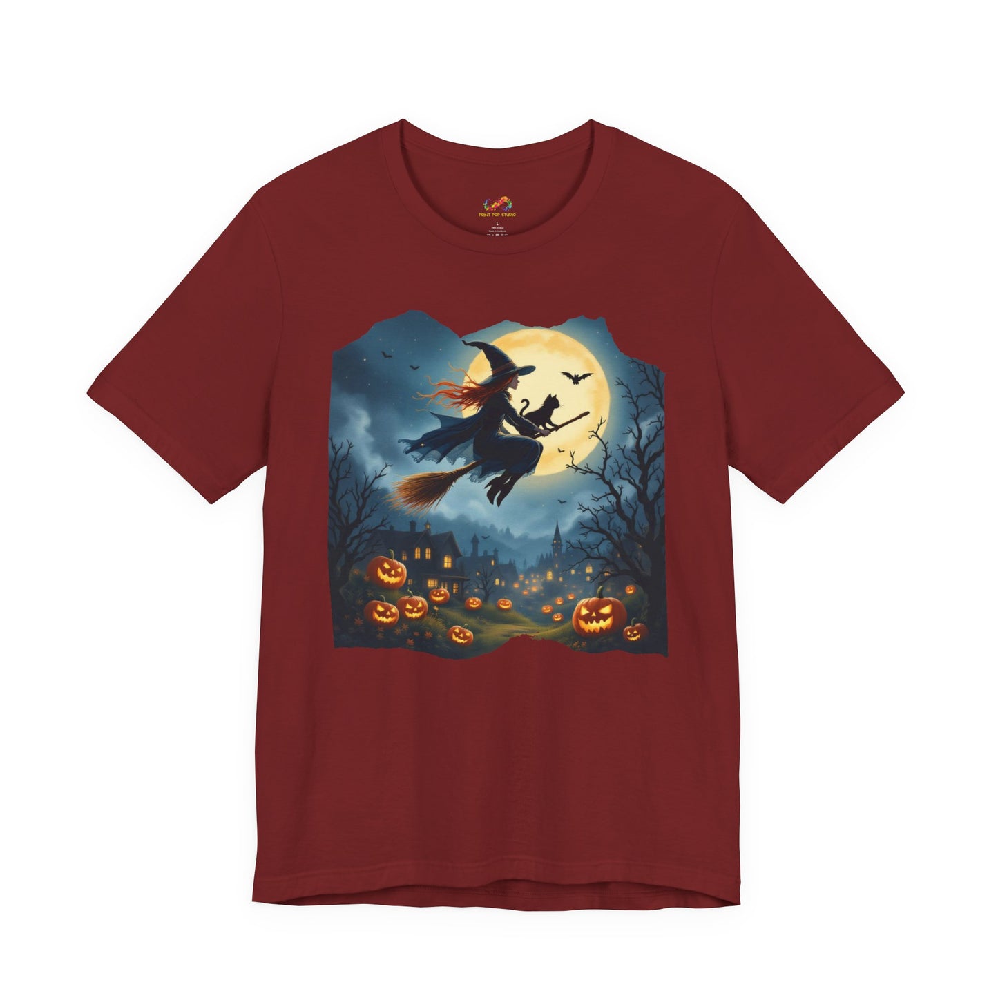Midnight Flight Tee Magic in the sky. Pumpkins below. Cozy spells in every thread.
