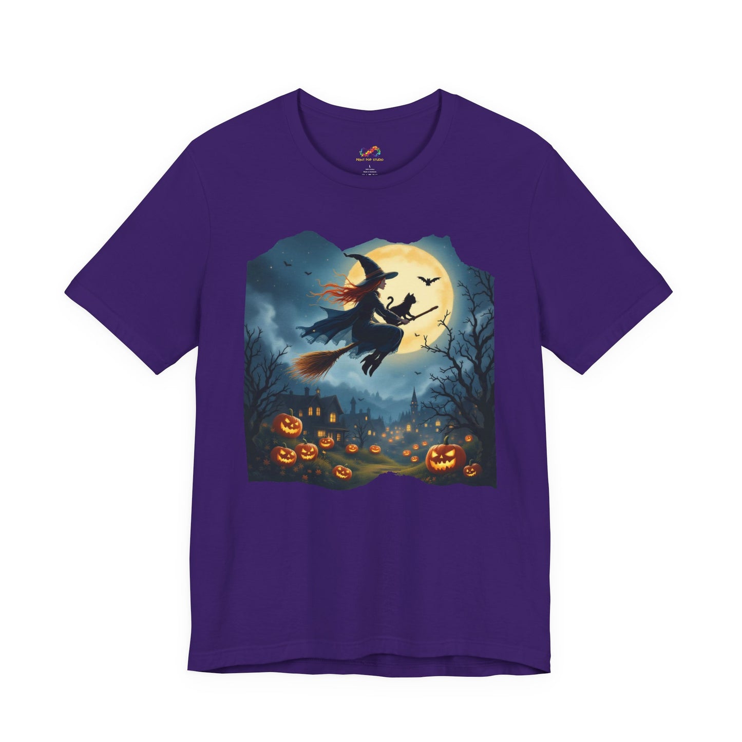 Midnight Flight Tee Magic in the sky. Pumpkins below. Cozy spells in every thread.
