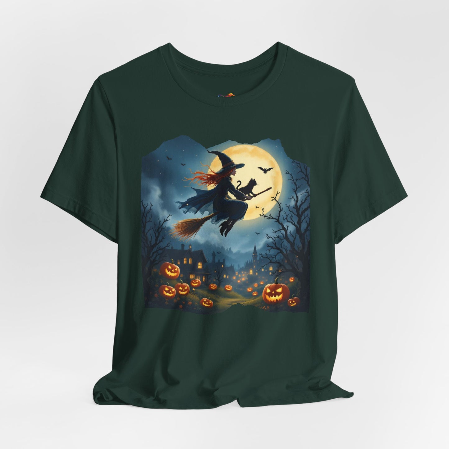 Midnight Flight Tee Magic in the sky. Pumpkins below. Cozy spells in every thread.